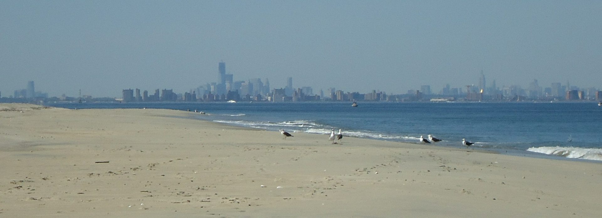 New Jersey shoreline at Sandy Hook with the New York City skyline in the distance